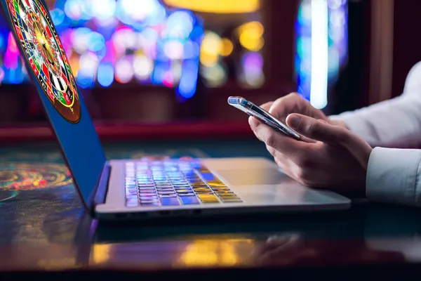 A woman smiling by bright slot machines showing lucky symbols, showcasing the exciting slot offerings at 7D77.